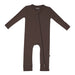 A zippered brown Kyte Baby romper for babies on a white background