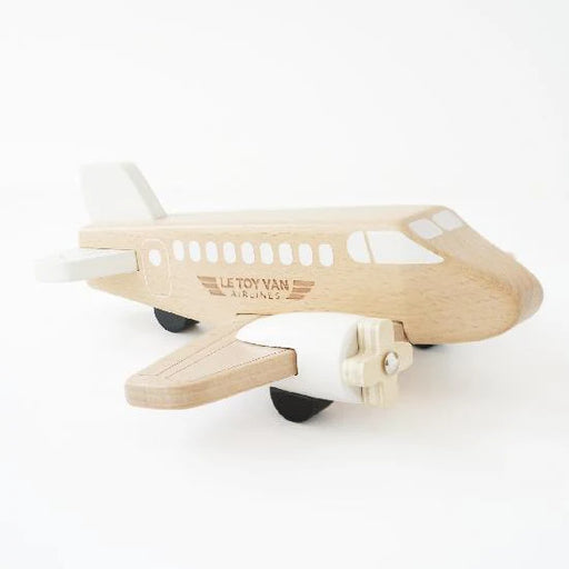 Wooden airplane toy with 'LE TOY VAN' branding on a white background