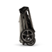 Folded stroller with 'Nuna' branding on a white background