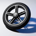 Black BMW wheel on a reflective surface with a blurred background