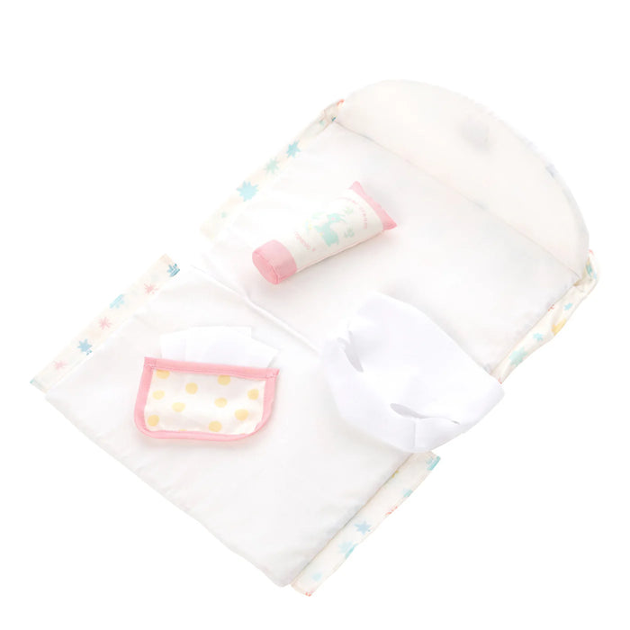 Baby blanket with colorful pocket designs on a white background