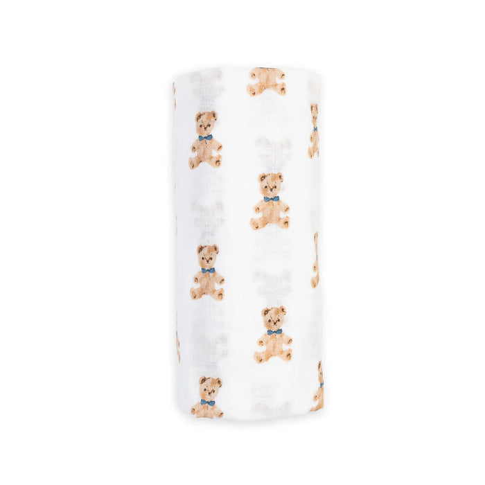 White swaddling blanket in muslin cotton with teddy bear pattern on a white background