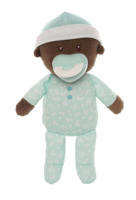 Stuffed toy bear in a light blue outfit with a white hat on a white background