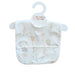 A white baby bib with a cute, minimalist cartoon print of kites, hanging on a white hanger. The bib has a front pouch pocket 