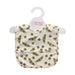 a sleeveless baby bib with green peas on a beige fabric set on a hanger on a white background