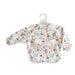 ocean-patterned baby bib on a hanger with Menoum Menoum branding.