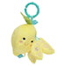 Yellow plush lemon toy with a smiley face and leaf on a white background