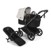 Black and white stroller with attached baby seat on a transparent background