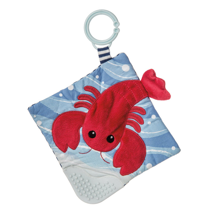 Red lobster plush toy with blue background on a white background