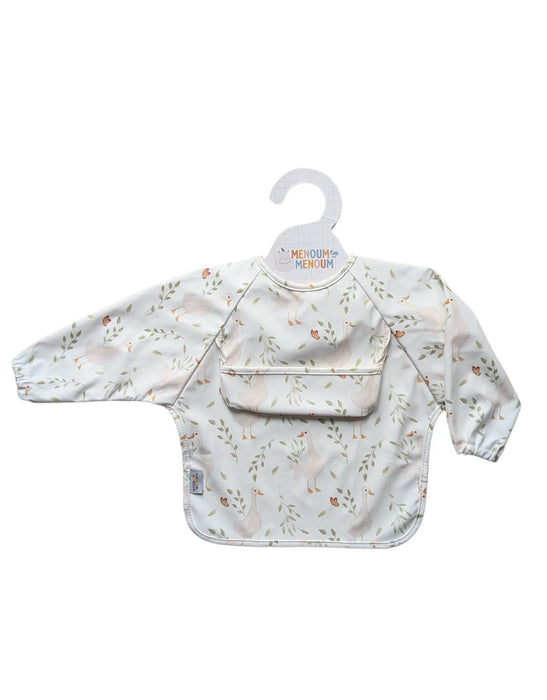 Baby bib with long sleeves on a hanger against a white background