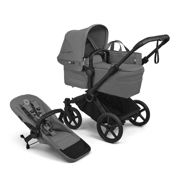 Gray baby stroller and toddler stroller seat on a white background
