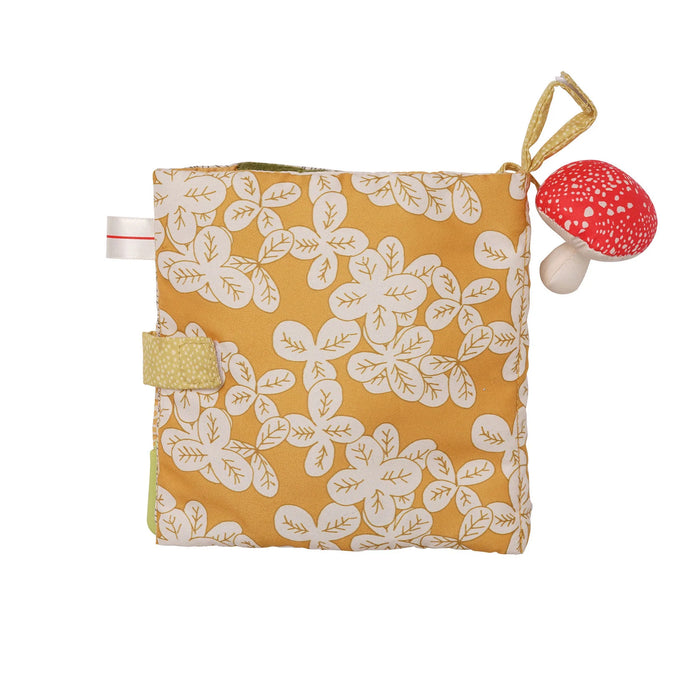 Small pouch with white floral pattern on a yellow background, featuring a red and white mushroom charm.