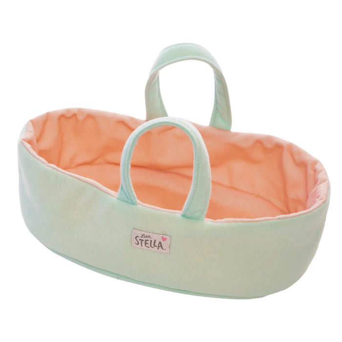 Mint green and peach baby basket with 'Love, Stella' branding on a white background