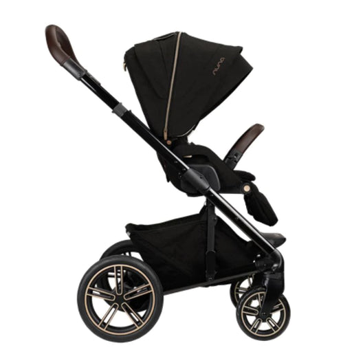 caption-Riveted Nuna Mixx Next Stroller in black, bronze and copper tones