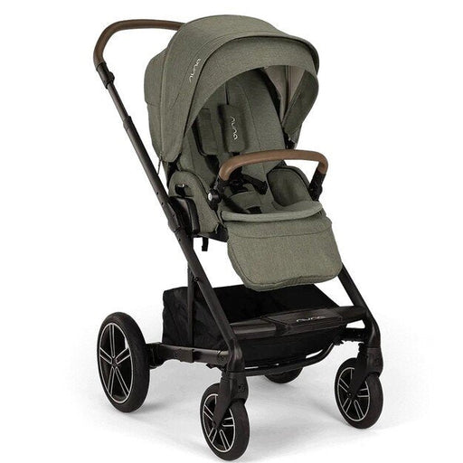 Green Nuna stroller with a black frame on a white background