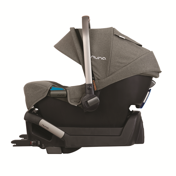 Nuna car seat with canopy and base on a white background
