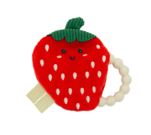 Strawberry-shaped teething ring with a green stem on a white background