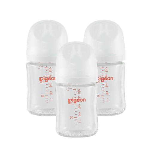 Three clear baby bottles with red 'Pigeon' branding on a white background