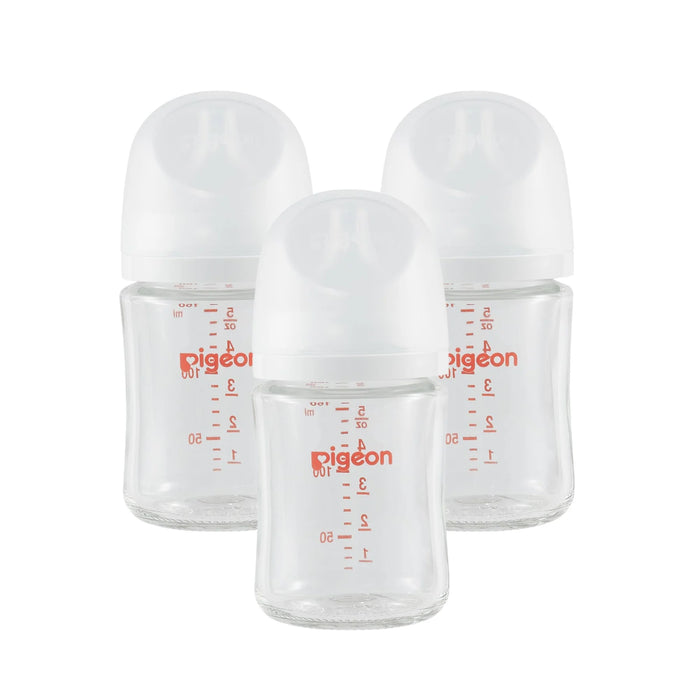 Three clear baby bottles with red 'Pigeon' branding on a white background