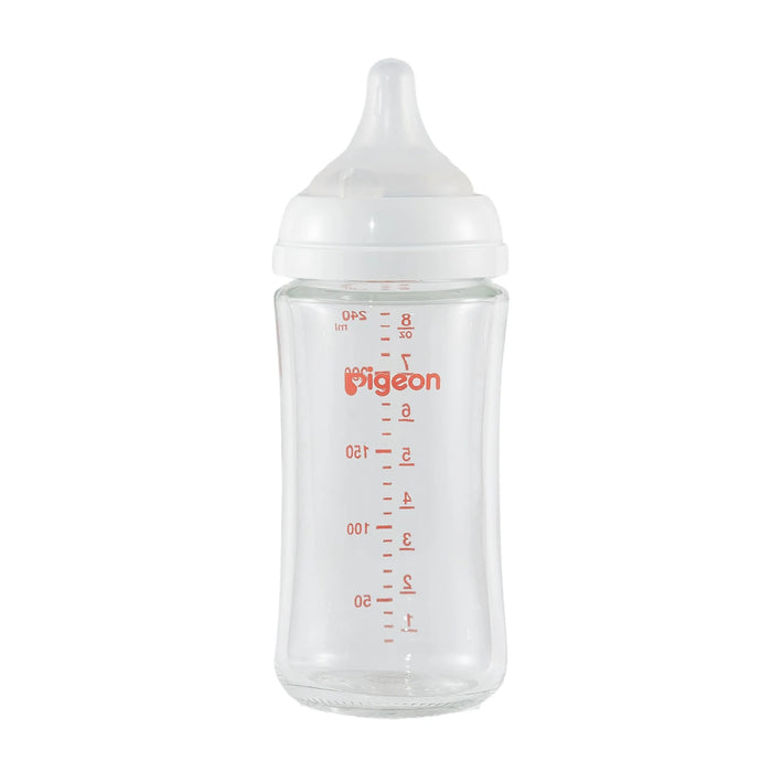 Pigeon glass baby bottle with dome shaped nipple on a white background