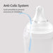 Bottle with anti-colic system feature on a light gray background