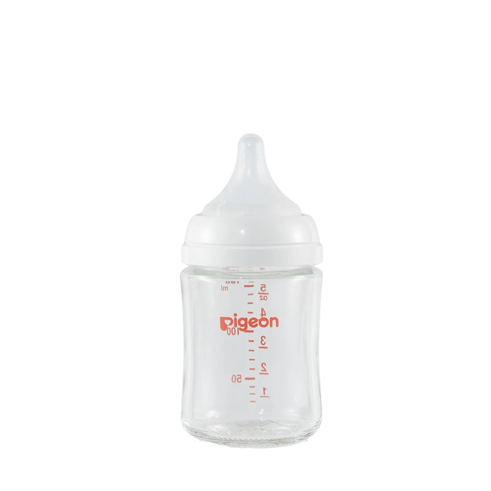 Clear baby bottle with red markings and 'Pigeon' branding on a white background