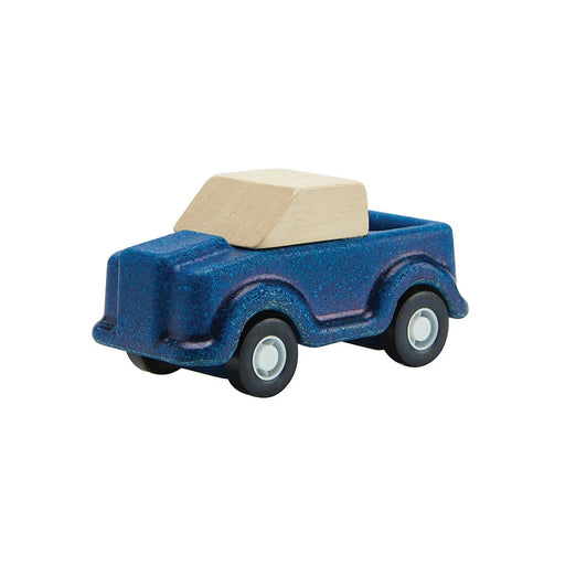 wooden toy truck in blue on white background