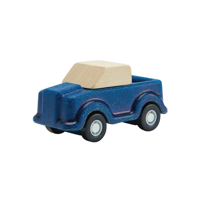 wooden toy truck in blue on white background