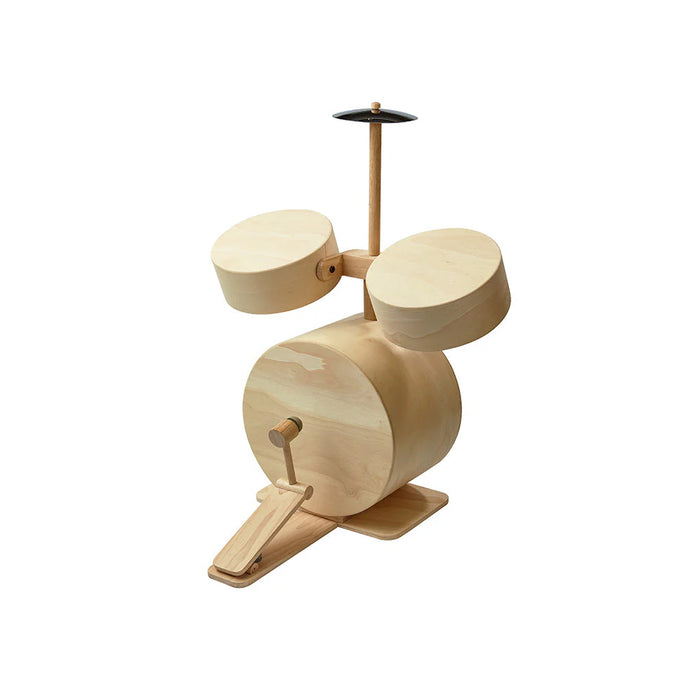 Wooden toy drum set on a white background