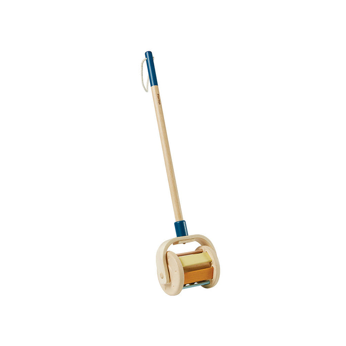 Wooden push toy showing orange and yellow panels and wooden wheels attached to a stick on a white background