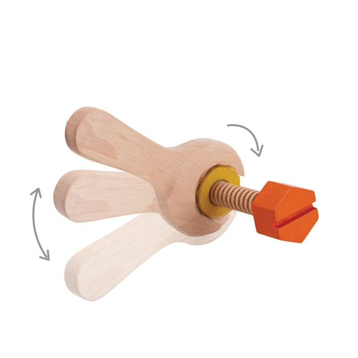 Wooden wrench tool with an orange bolt on a white background