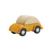 wooden toy car in yellow on white background