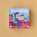 Board game box titled 'The Postman Game' on a beige background