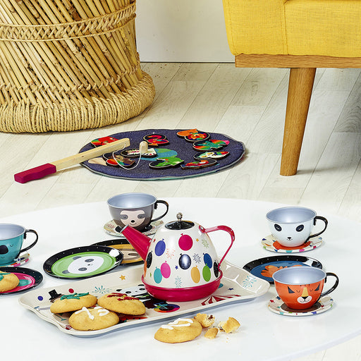 caption-Tea Set on display with cookies