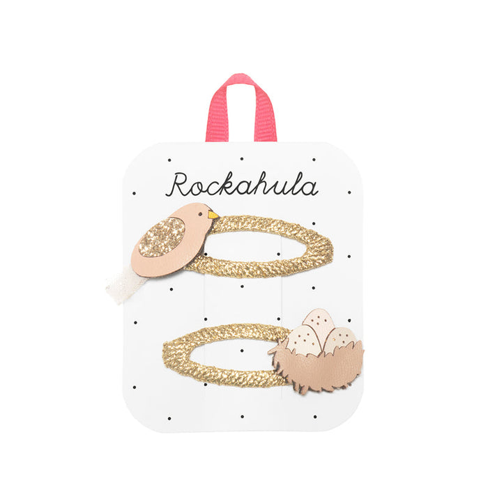 Packaged hair accessories with 'Rockahula' branding on a white background