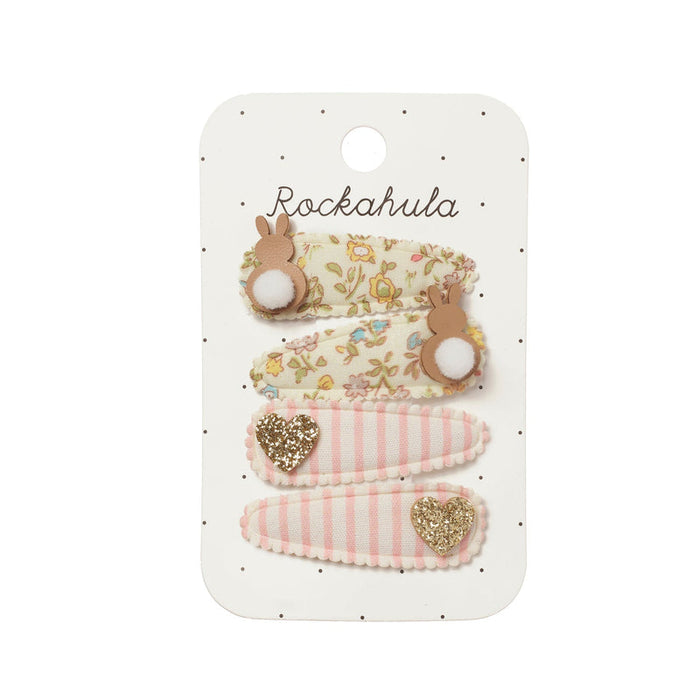 Set of four decorative hair clips on a Rockahula branded card.