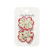Two scalloped flower hair clips with cream centers, red borders, and small multicolor florals, displayed on a white card labeled Rockahula.