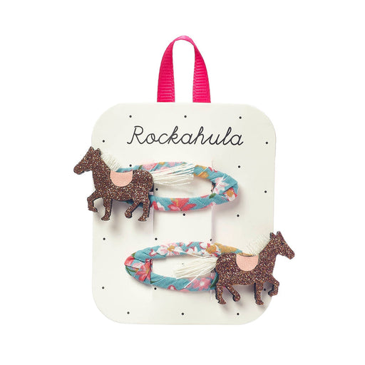 Set of horse-themed hair accessories on a Rockahula branded card.