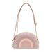 A small crescent-shaped shoulder bag with a glittery rainbow design in pastel pink, lavender, and gold, featuring a matching pink strap and gold-tone hardware, shown on a plain white background.