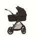 Black stroller with gold accents on a white background