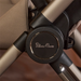 Close-up of a stroller handle with 'Silver Cross' branding.