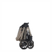 Foldable stroller with beige frame and black wheels on a white background