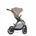 Beige stroller with a canopy on a white background