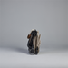Folded baby stroller on a gray background