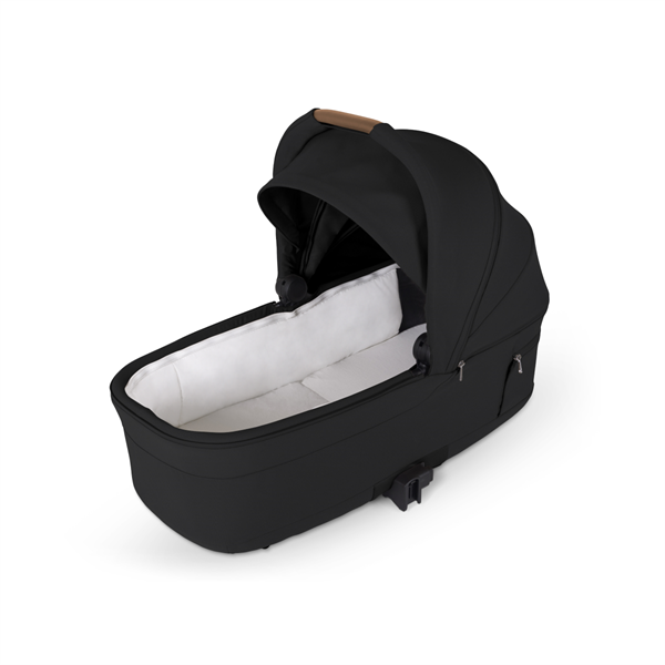 Black baby bassinet with white interior on a white background