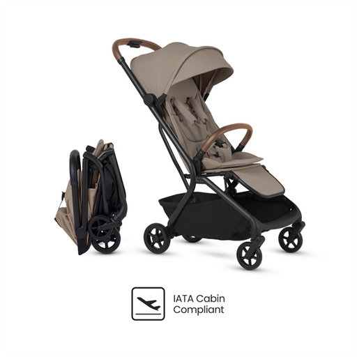 Beige and black stroller with IATA Cabin Compliant label on a white background