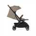 Beige and black stroller on a white background