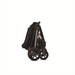 Black and gold baby stroller on a white background