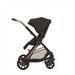 Black stroller with gold accents on a white background