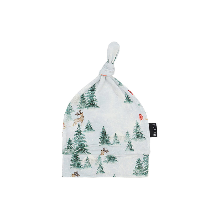 belan j Baby hat with forest pattern on a white background